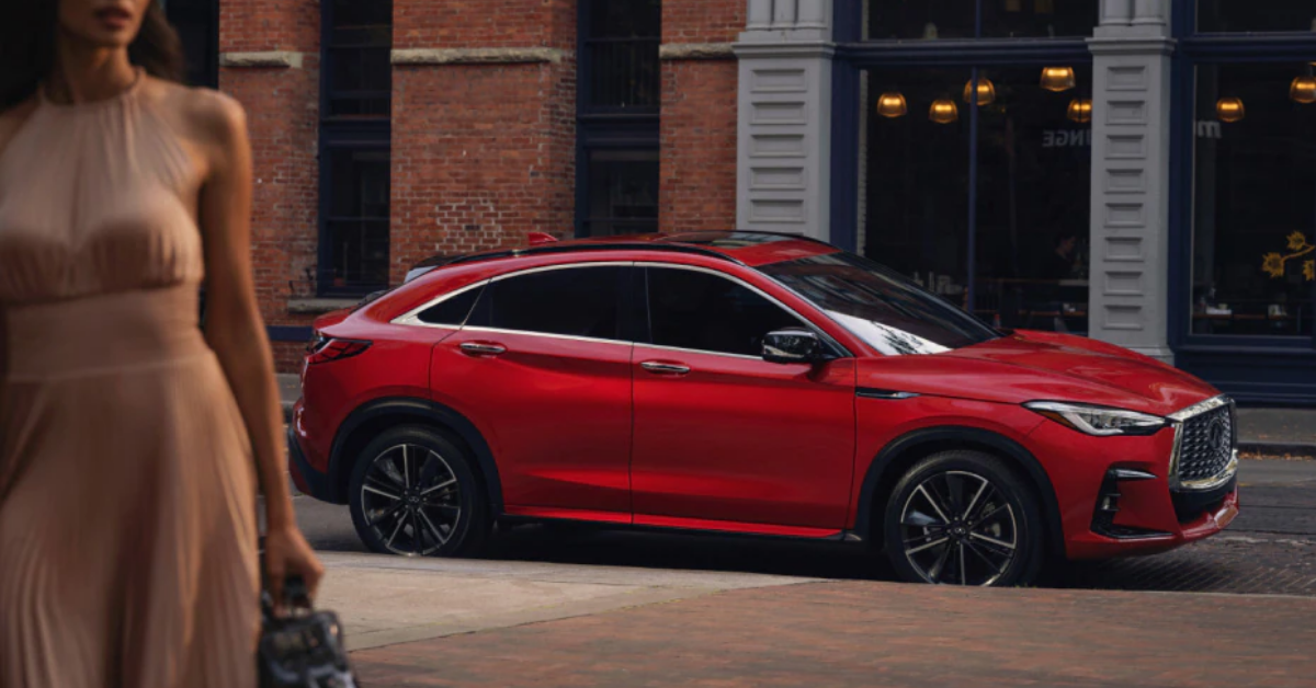 2025 INFINITI QX55 parked in front of a building