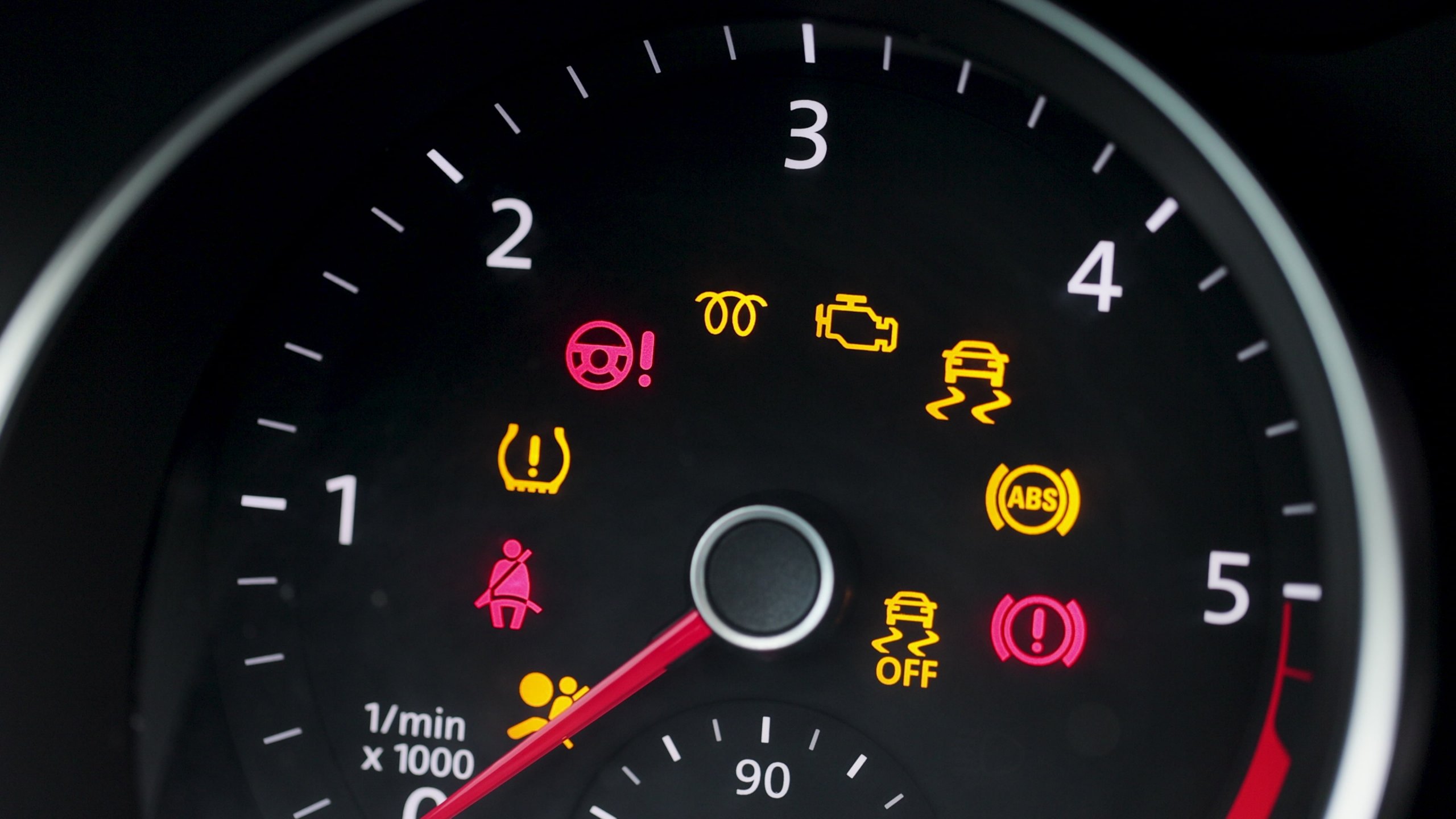 Car speedometer with all the dashboard warning lights lit up